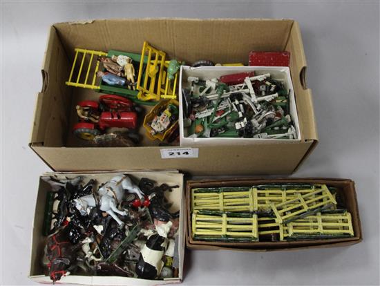A collection of toy farmyard animals etc